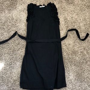 Black dress with tie waist and ruffle top detail